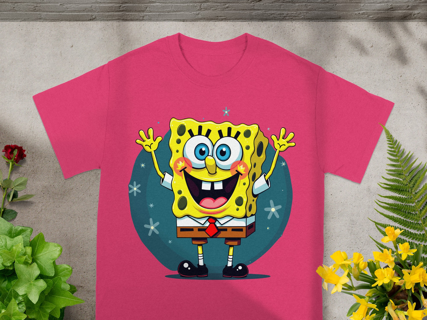 Pink t-shirt with Spongebob Squarepants cartoon character graphic.