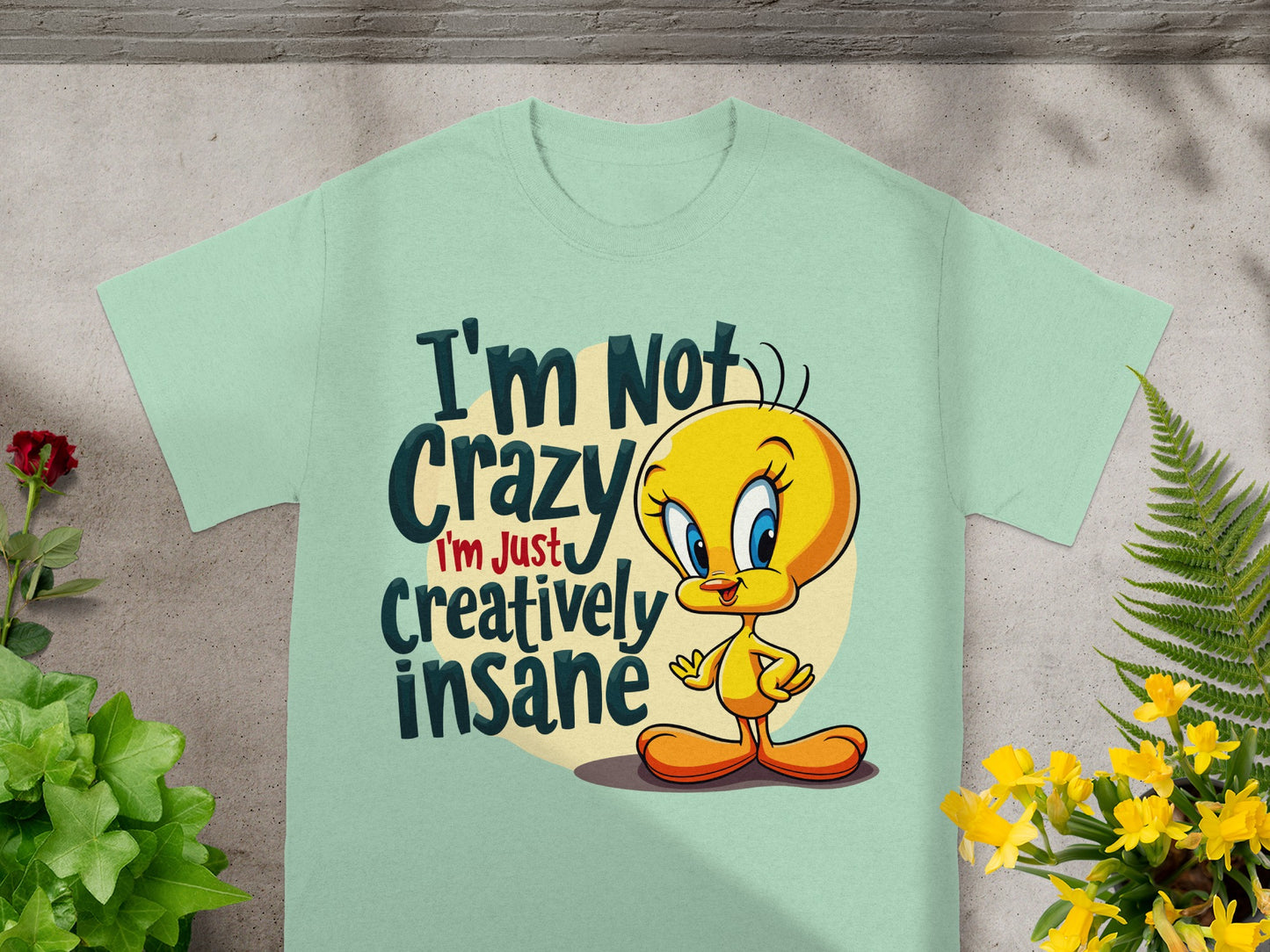 Light blue t-shirt with Tweety Bird and text "I'm Not Crazy I'm Just Creatively Insane".