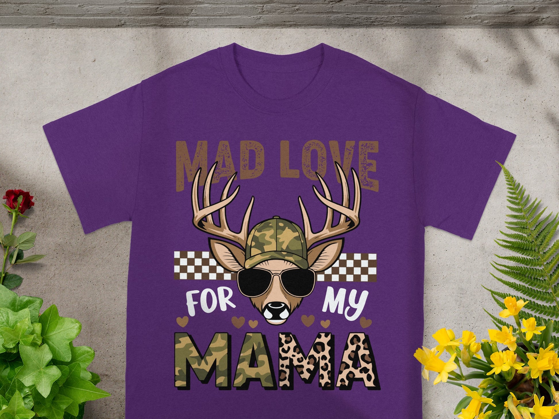 Purple t-shirt with deer wearing sunglasses and camouflage hat, text says "Mad Love For My Mama".