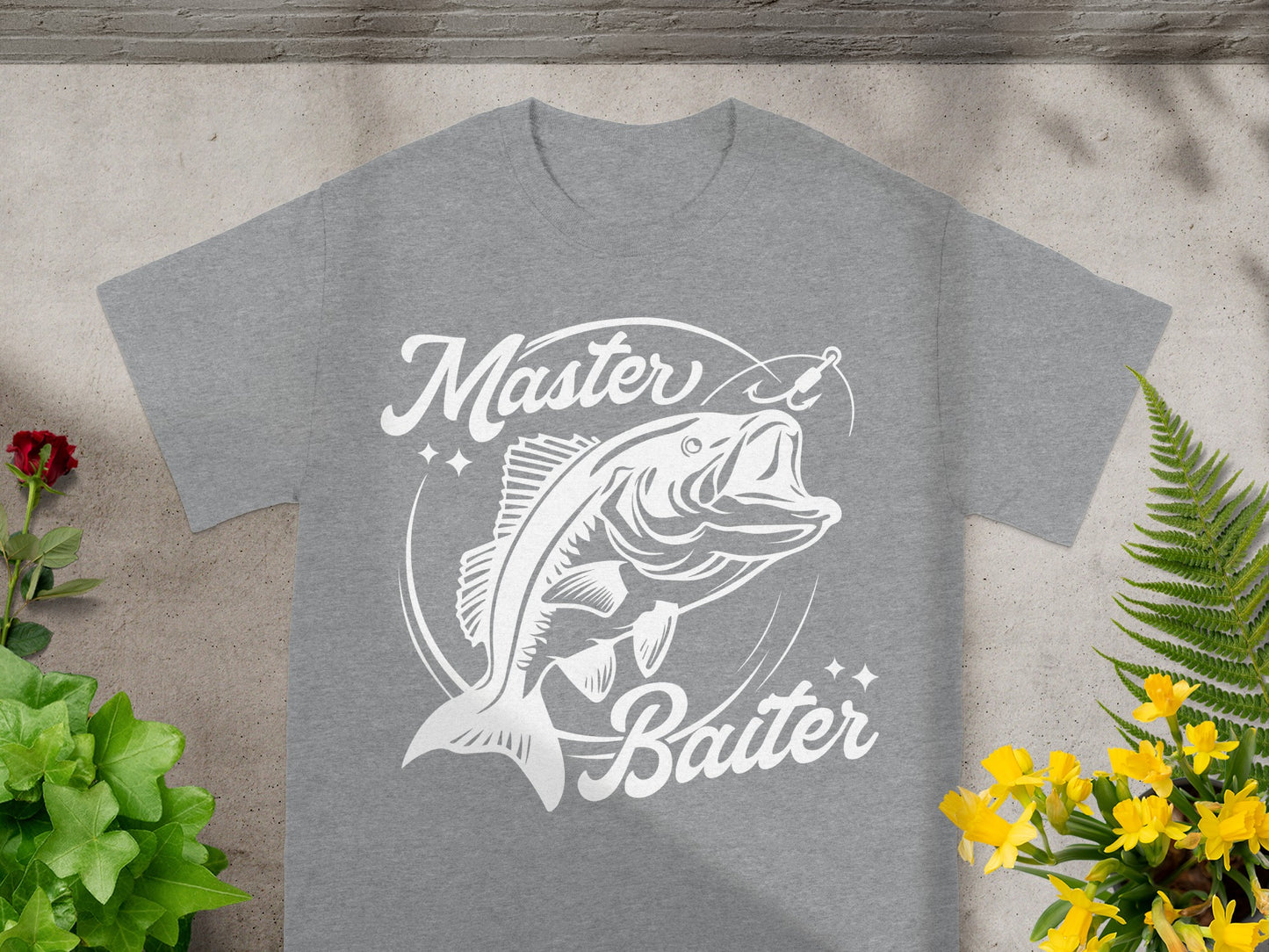 Grey t-shirt with white graphic of a jumping bass and text "Master Baiter".