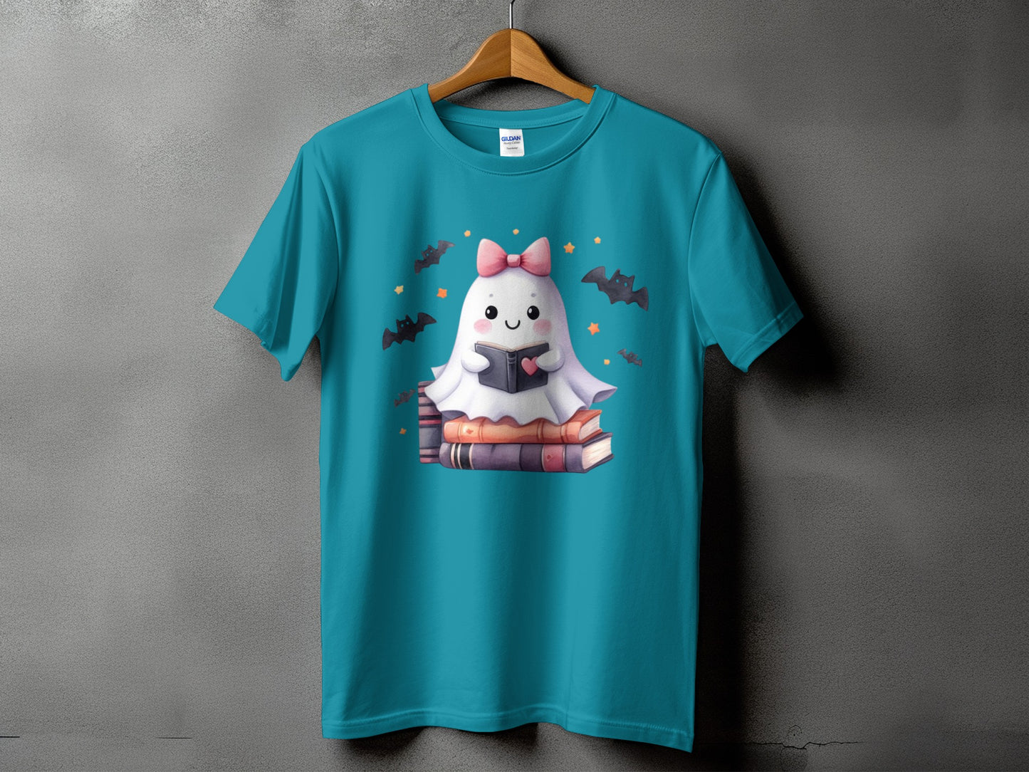 Cute ghost wearing a pink bow reading a book surrounded by bats and stars.