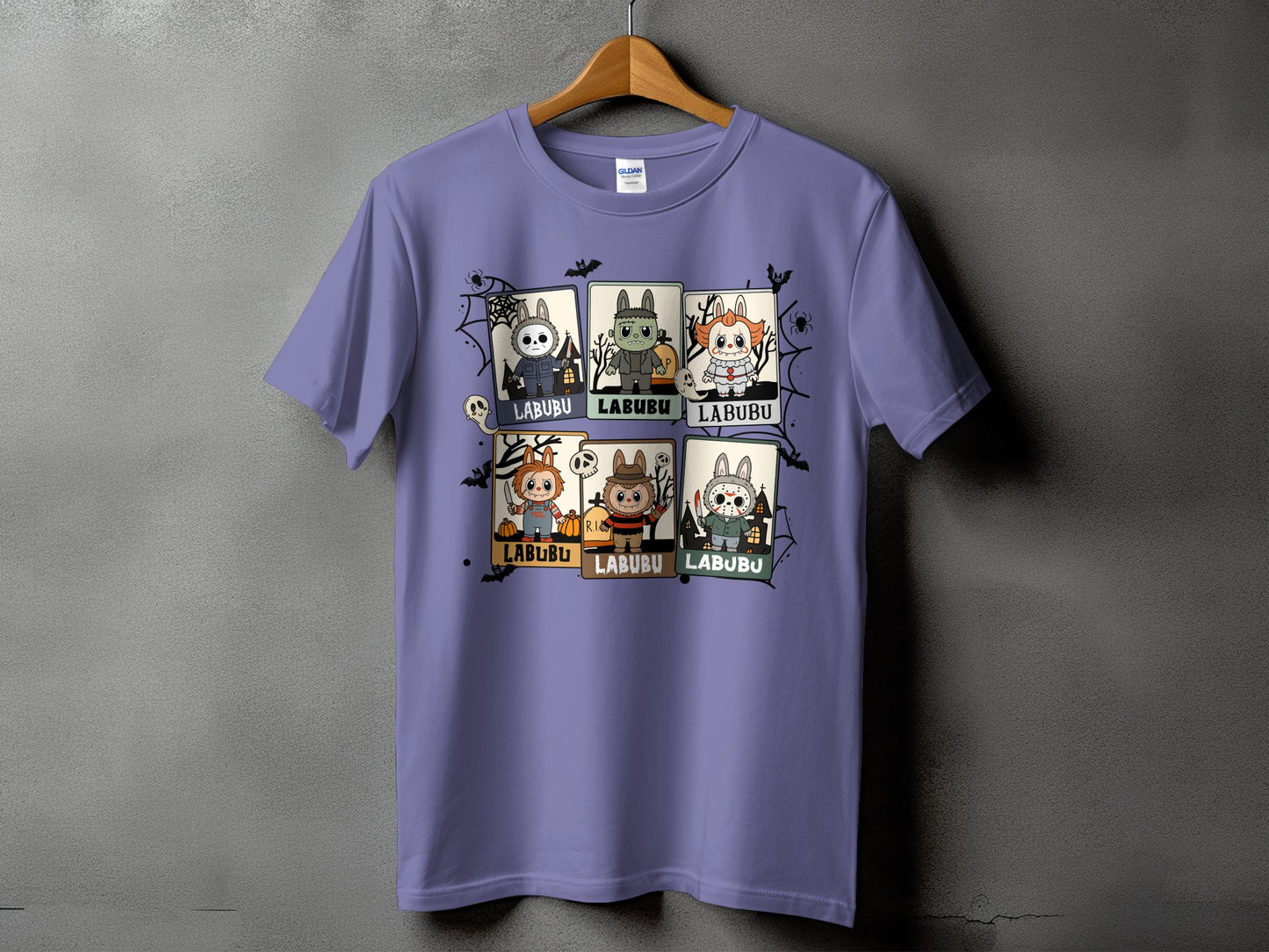 Purple t-shirt with six Halloween-themed Labubu characters in framed panels.