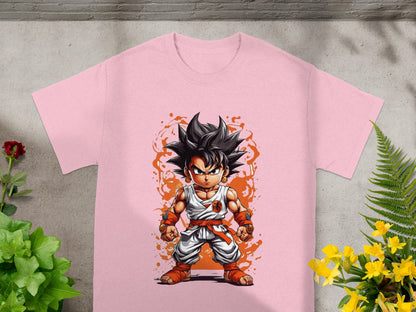 Goku in orange and white gi, arms outstretched, on a pink t-shirt.