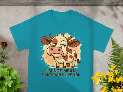 Teal t-shirt with a cartoon cow and text "I'm not mean, I just don't like you."