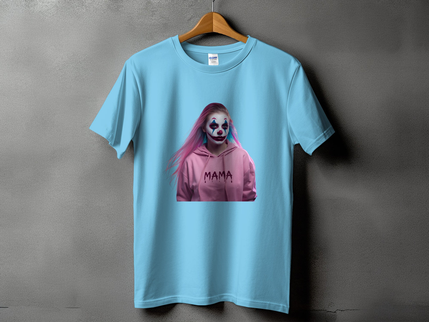Light blue t-shirt with a clown design and the word "MAMA" printed on it.
