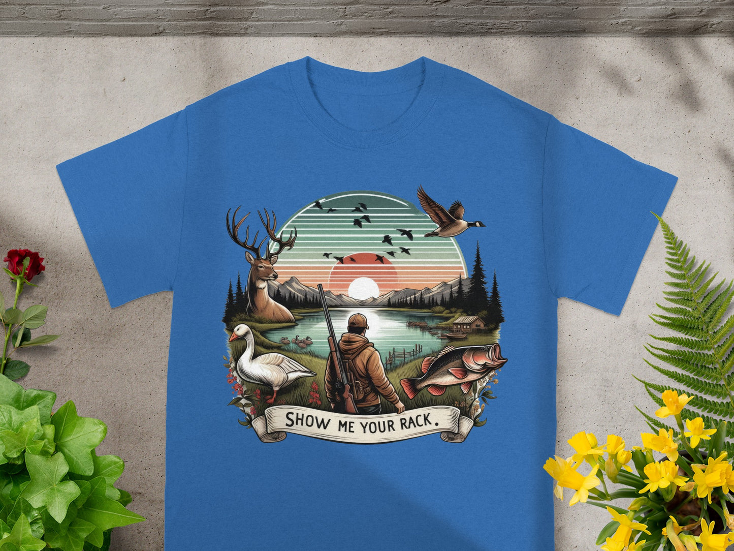 Hunter with deer, goose, fish, and ducks at sunset, text "Show Me Your Rack".
