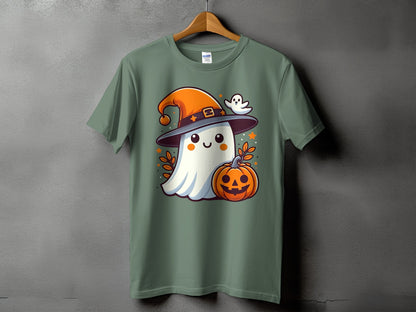 Green t-shirt with a cartoon ghost wearing a witch hat holding a pumpkin.