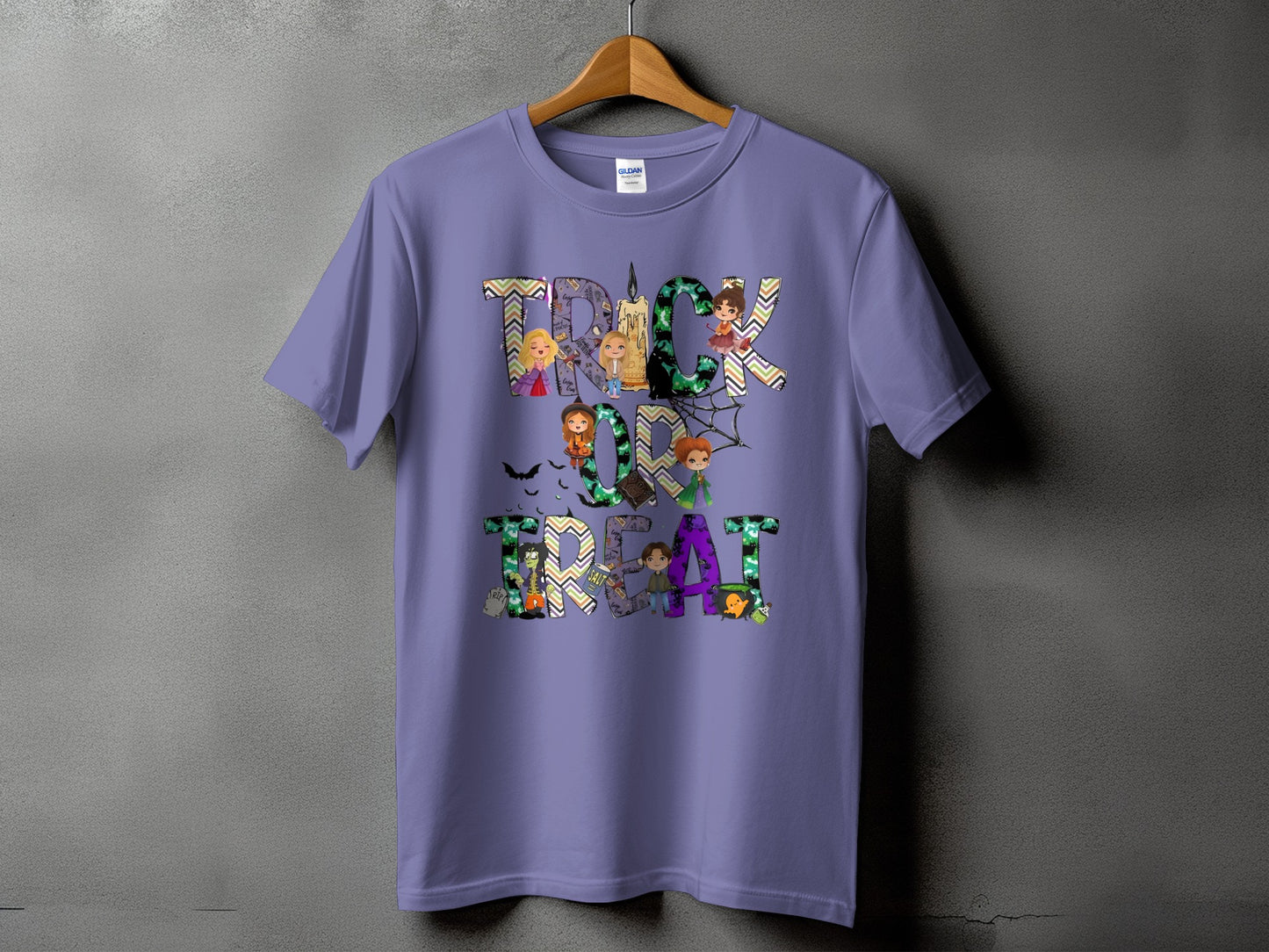 Purple t-shirt with "TRICK OR TREAT" Halloween graphic featuring cartoon characters.