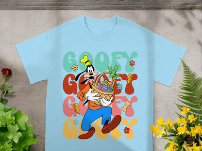 Goofy in a colorful Easter graphic on a light blue t-shirt.