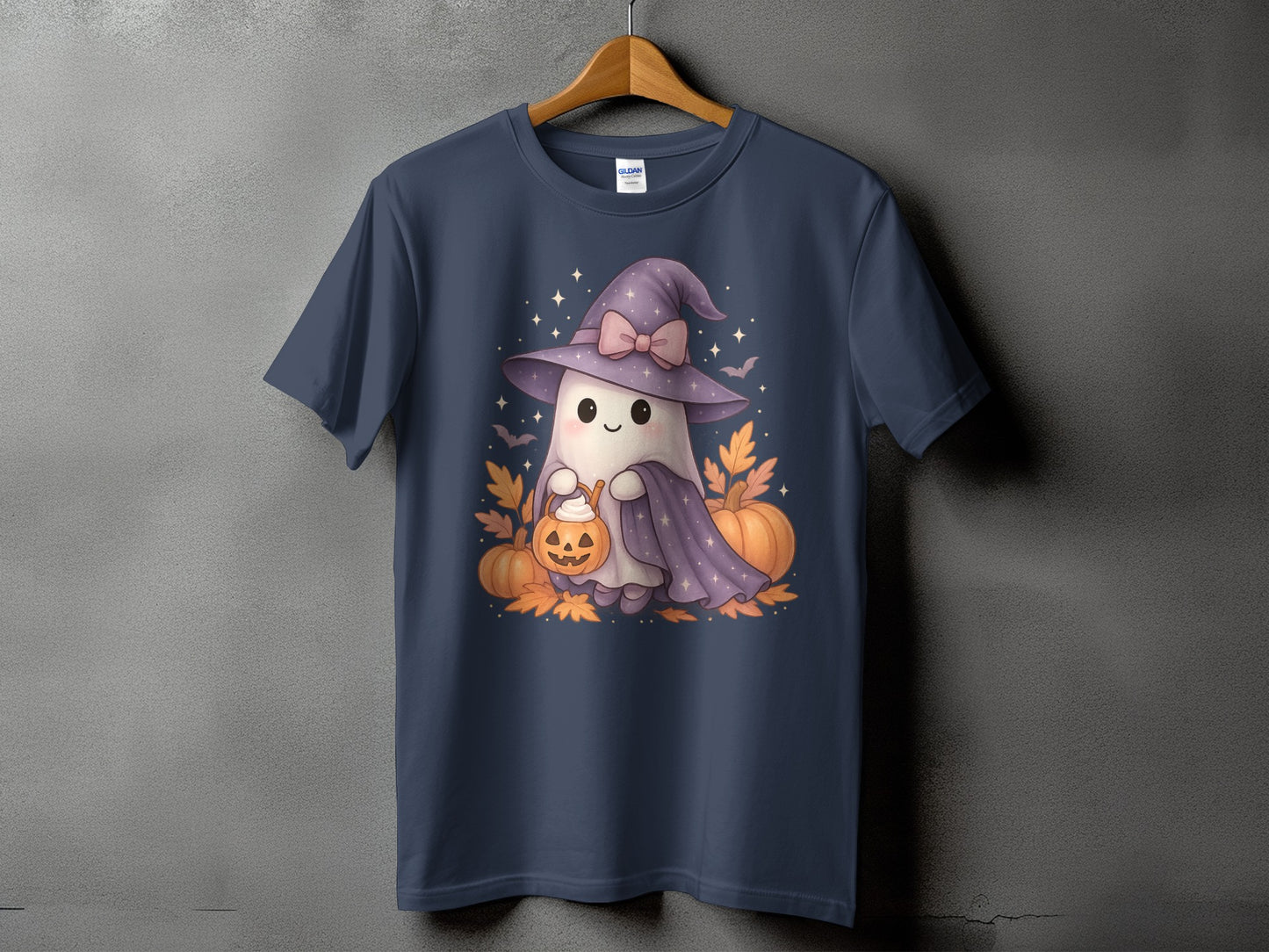 Dark blue t-shirt featuring a kawaii ghost in a witch hat holding a pumpkin basket.