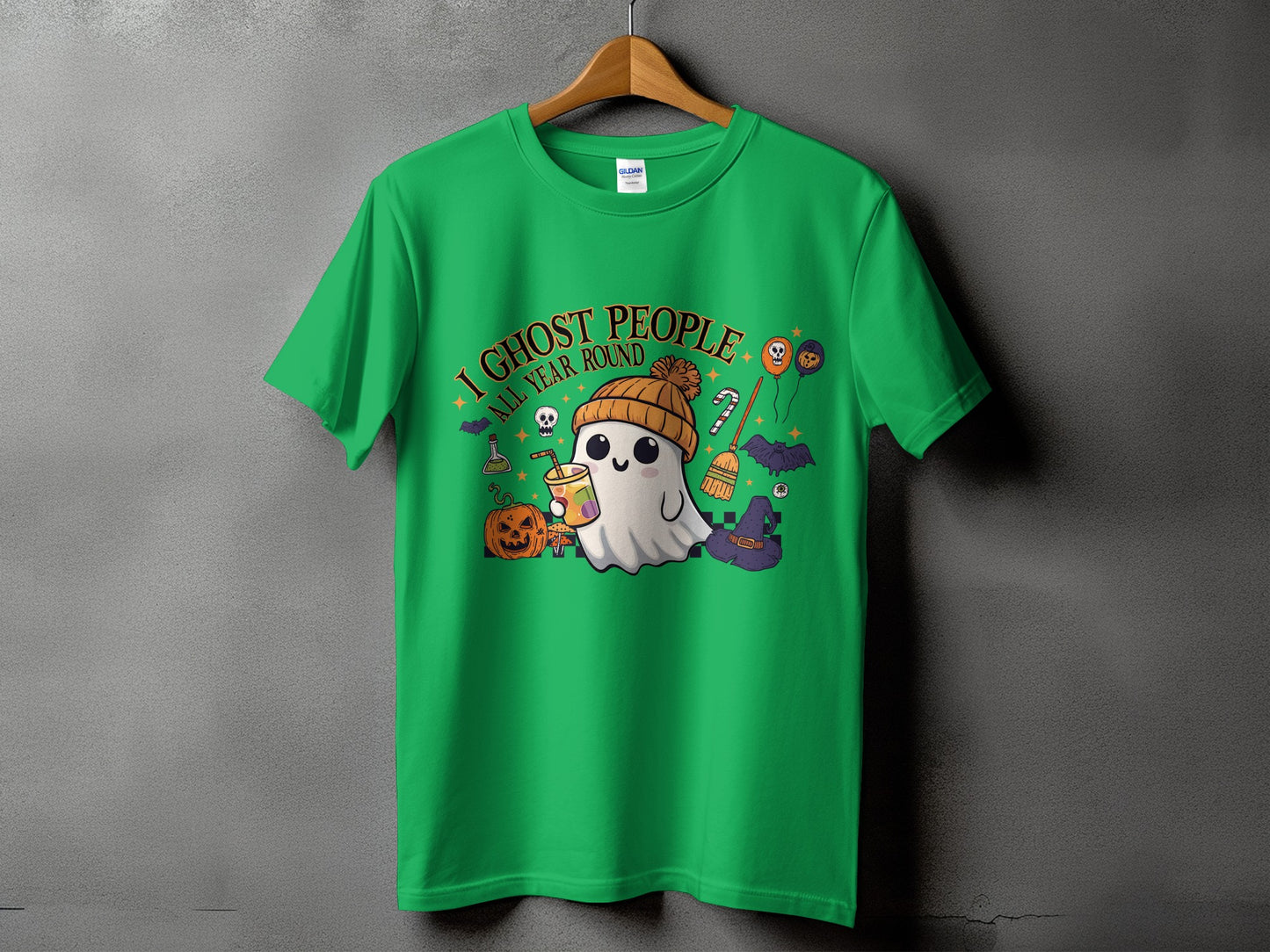 Green t-shirt with ghost graphic that says "I Ghost People All Year Round".
