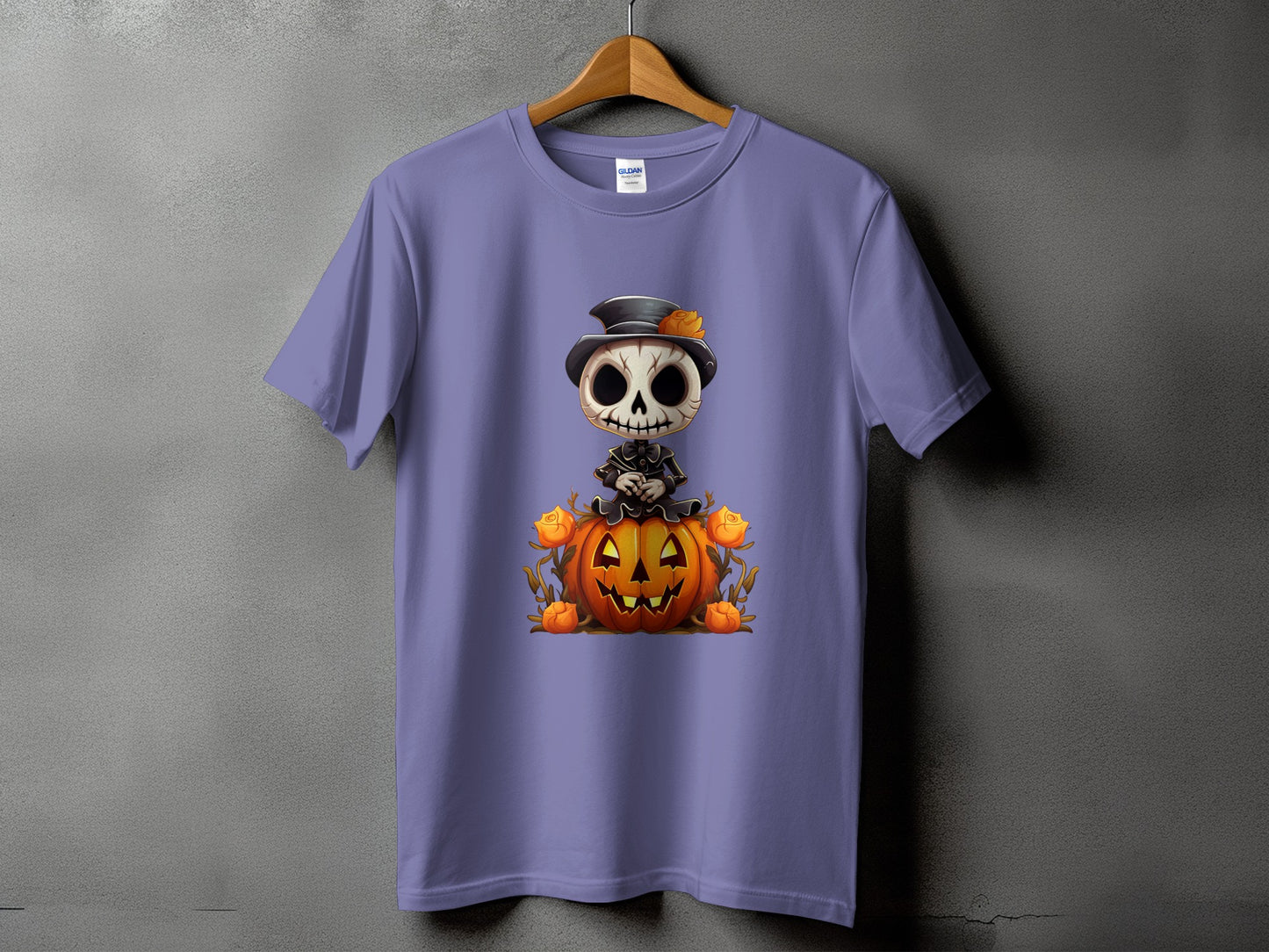Purple t-shirt with a cartoon skeleton sitting on a jack-o'-lantern.