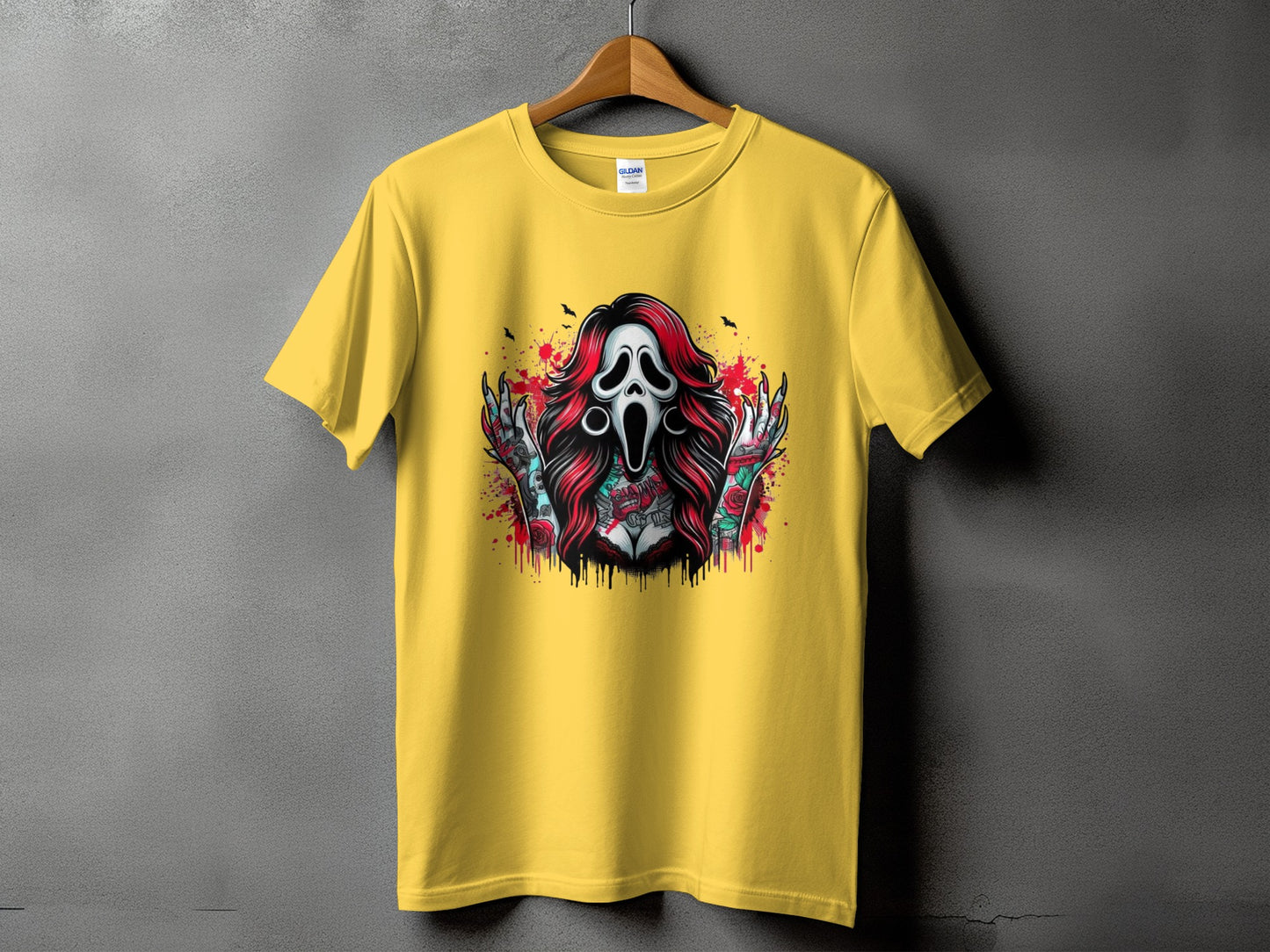 Yellow t-shirt with horror mask, roses, and tattoos graphic.