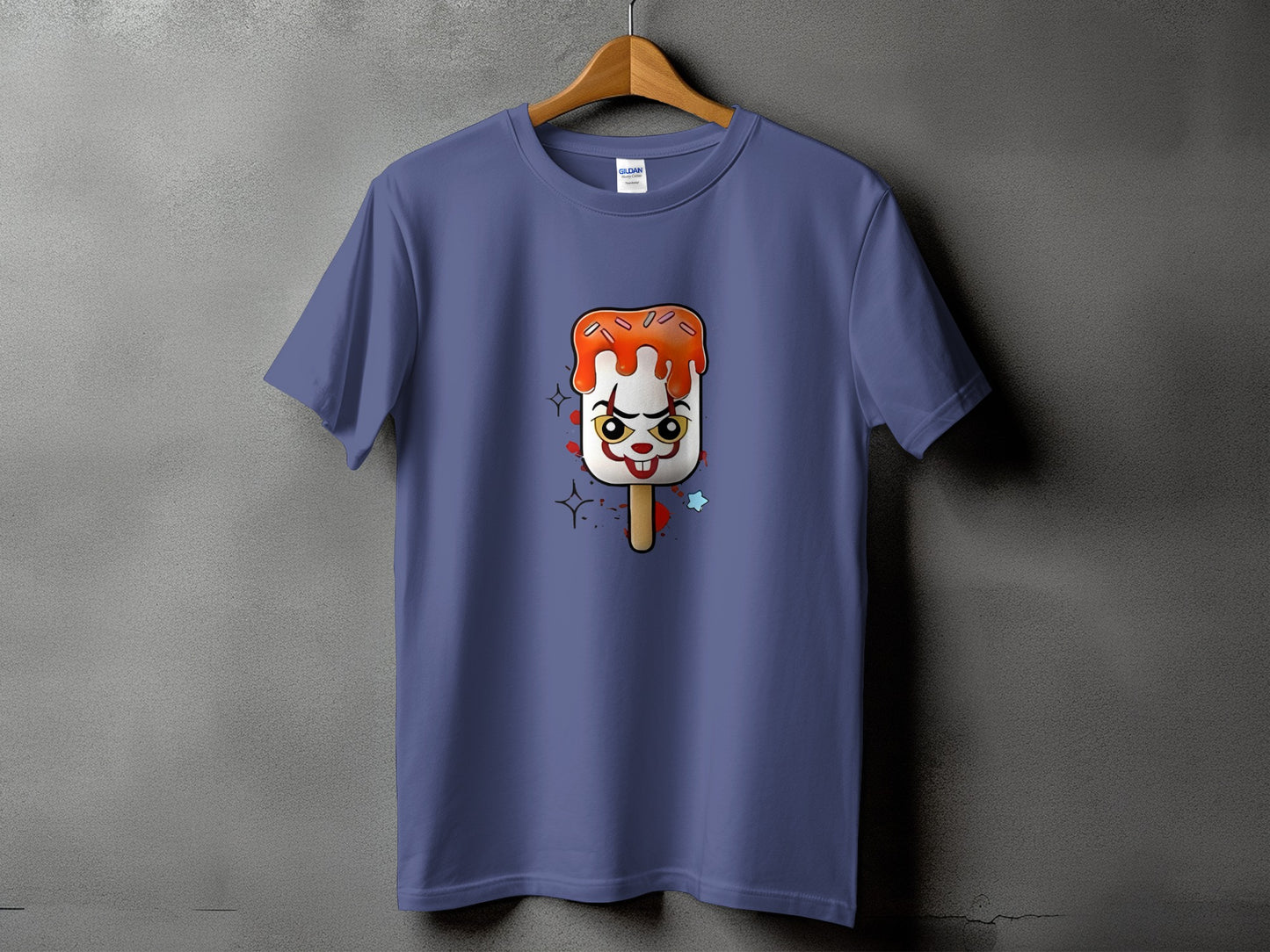 T-shirt with a creepy clown popsicle graphic and glitter accents.