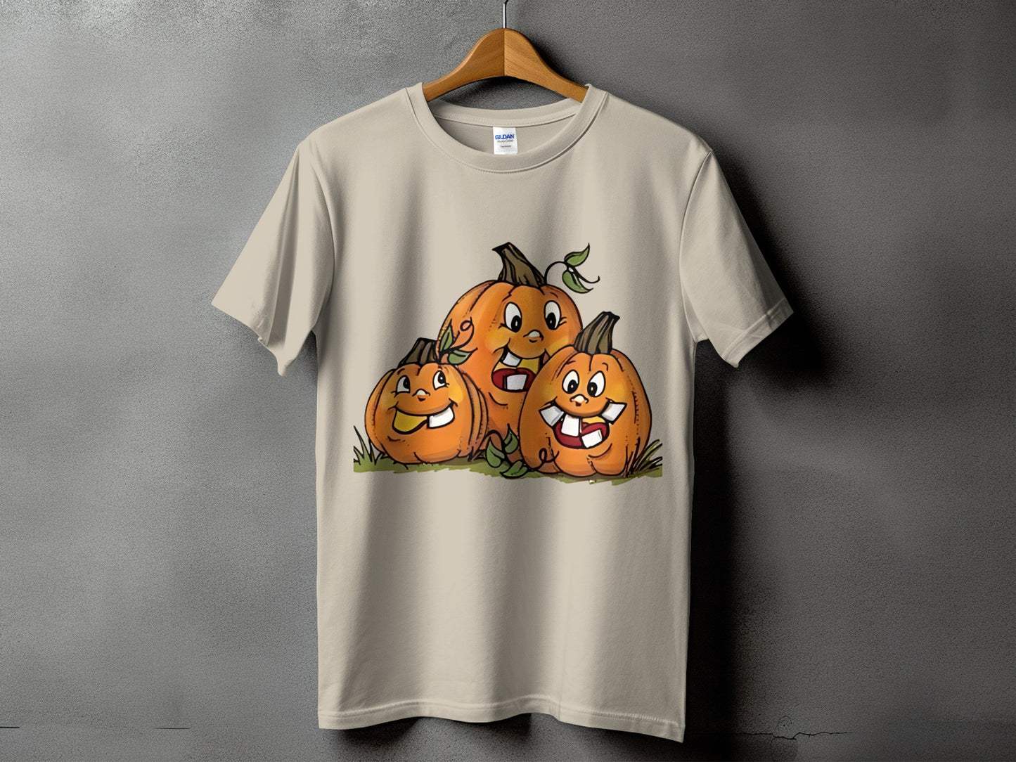 T-shirt with cartoon pumpkins smiling and showing teeth.