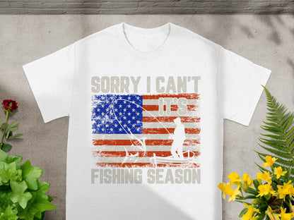 White t-shirt with distressed American flag and fishing design: "Sorry I Can't It's Fishing Season".