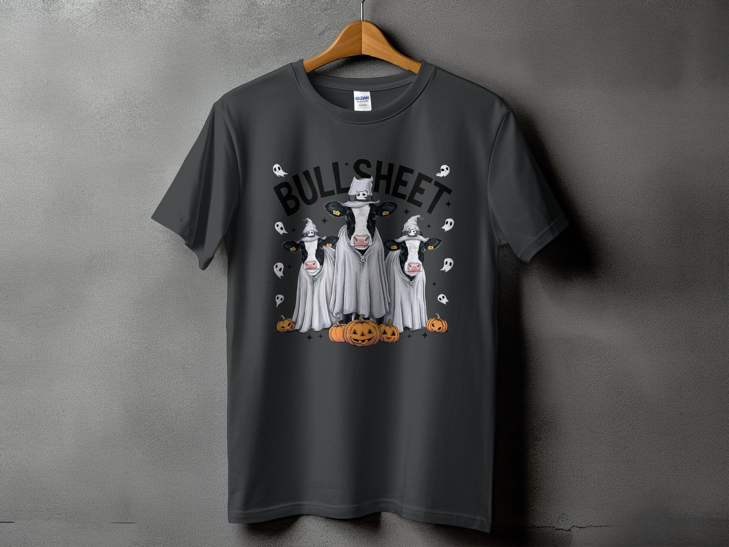 Three cows in ghost costumes with hats and pumpkins, "BULL SHEET" text.