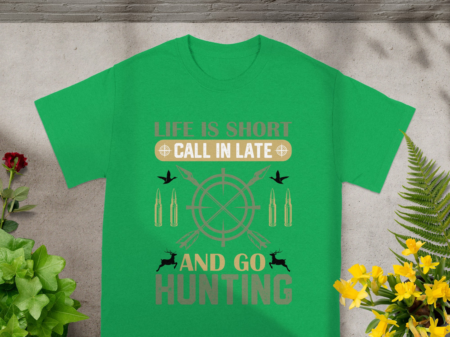 Green t-shirt with "Life Is Short, Call In Late And Go Hunting" text and graphic.