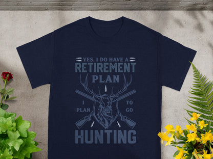Navy t-shirt with "Yes, I do have a retirement plan. I plan to go hunting." graphic.