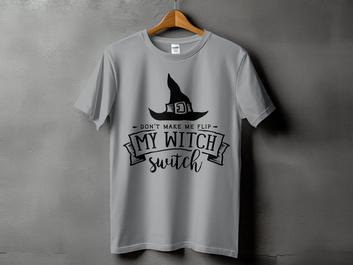 Grey t-shirt with a black witch hat graphic and text reading "Don't Make Me Flip My Witch Switch".