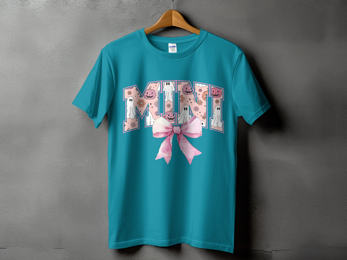 Teal t-shirt with "Mimi" in pink with Halloween ghosts, pumpkins, and flowers.
