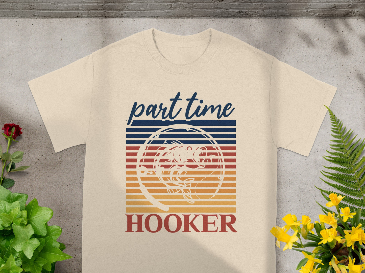 Cream t-shirt with "part time HOOKER" and vintage fish graphic.