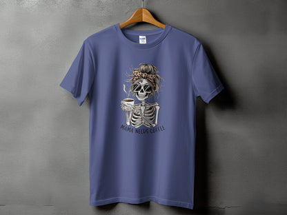 Skeleton with sunglasses and messy bun holding coffee cup, text "Mama Needs Coffee".