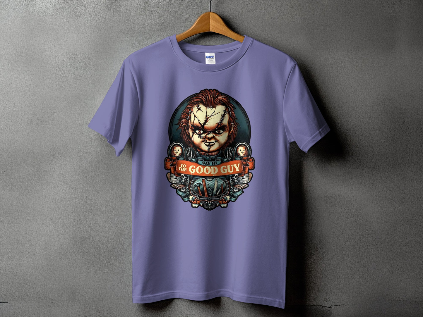Purple t-shirt featuring Chucky with text "TO THE GOOD GUY SAY HI".