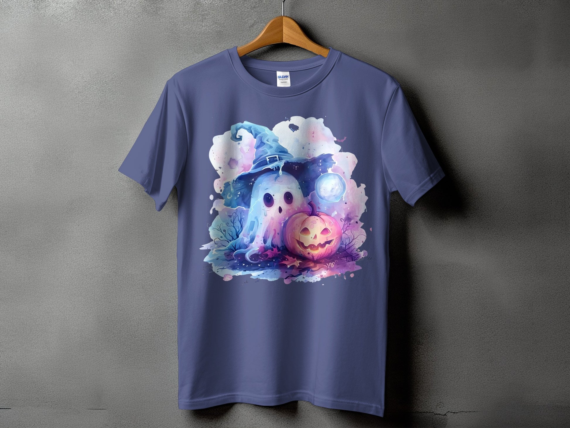 T-shirt with watercolor ghost, witch hat, and carved pumpkin Halloween graphic.