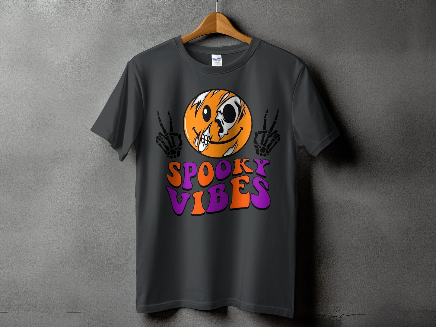 Dark gray t-shirt with skeleton hands and skull smiley face graphic.