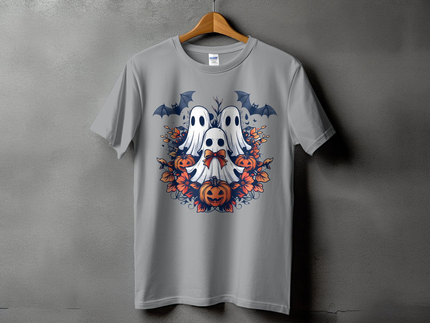 Gray t-shirt with a Halloween design of ghosts, pumpkins, bats, and leaves.