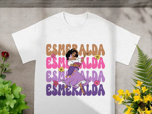 White t-shirt featuring a colorful cartoon graphic of Esmeralda dancing.