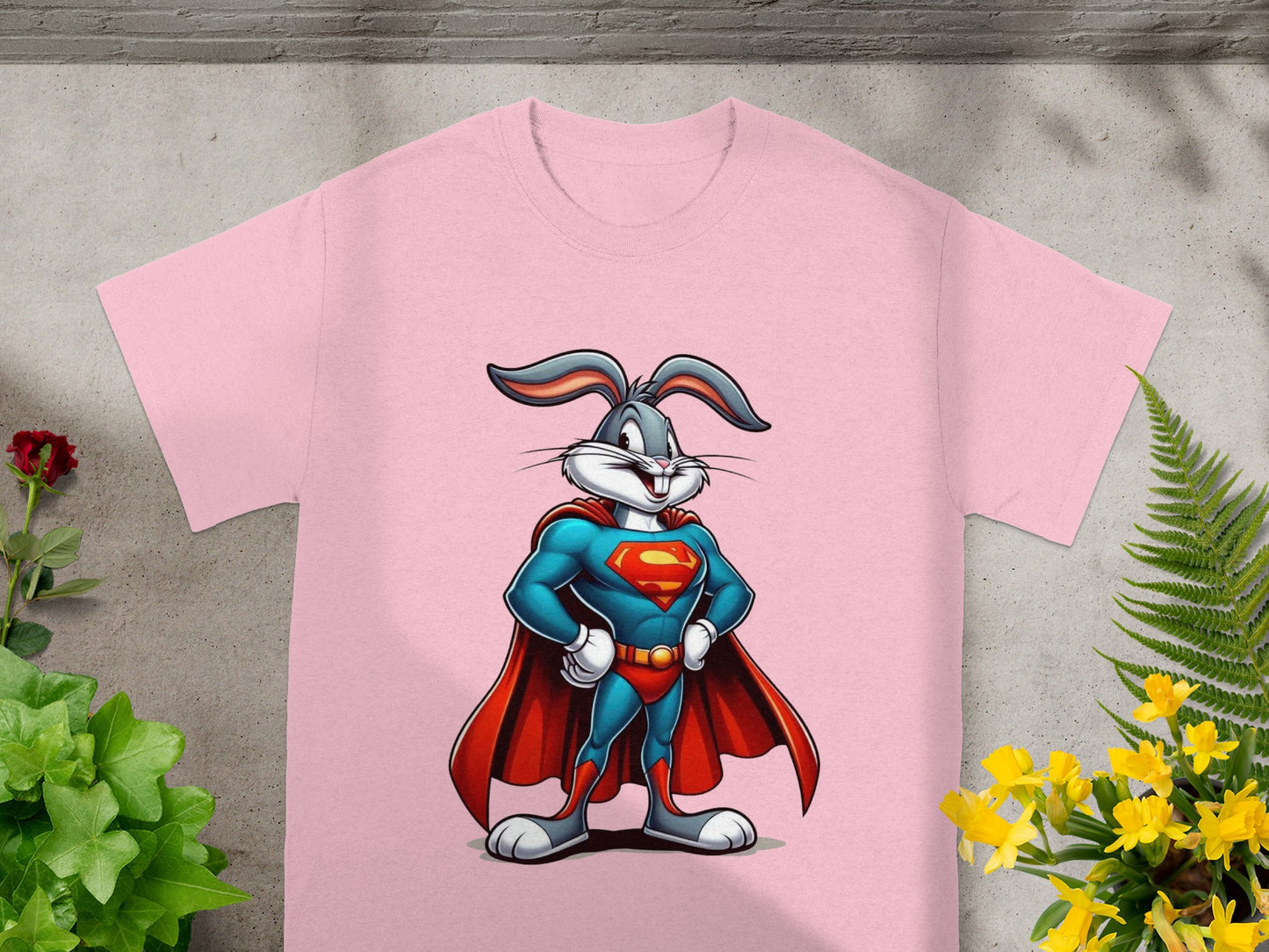 Pink t-shirt with Bugs Bunny in Superman costume, standing with hands on hips.