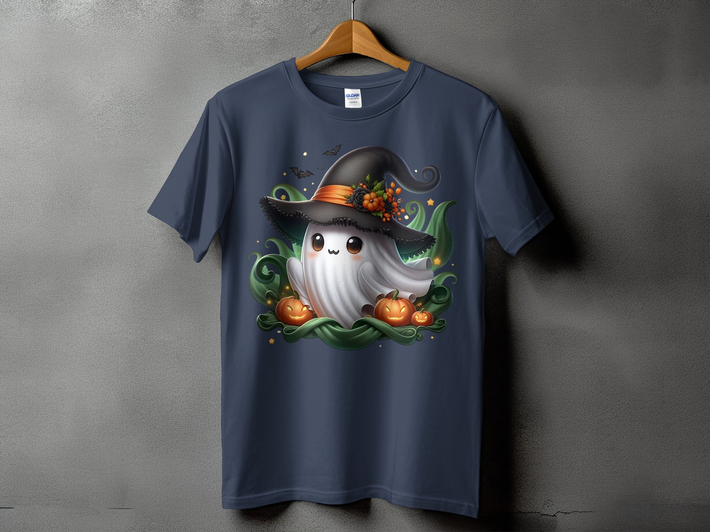 Ghost with witch hat, pumpkins, and bats on a navy blue t-shirt.