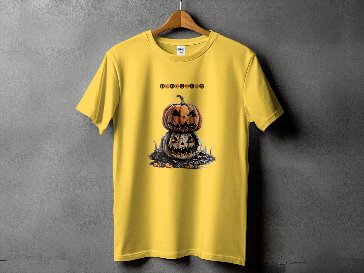 Yellow t-shirt with stacked jack-o'-lanterns and "Halloween" text above.