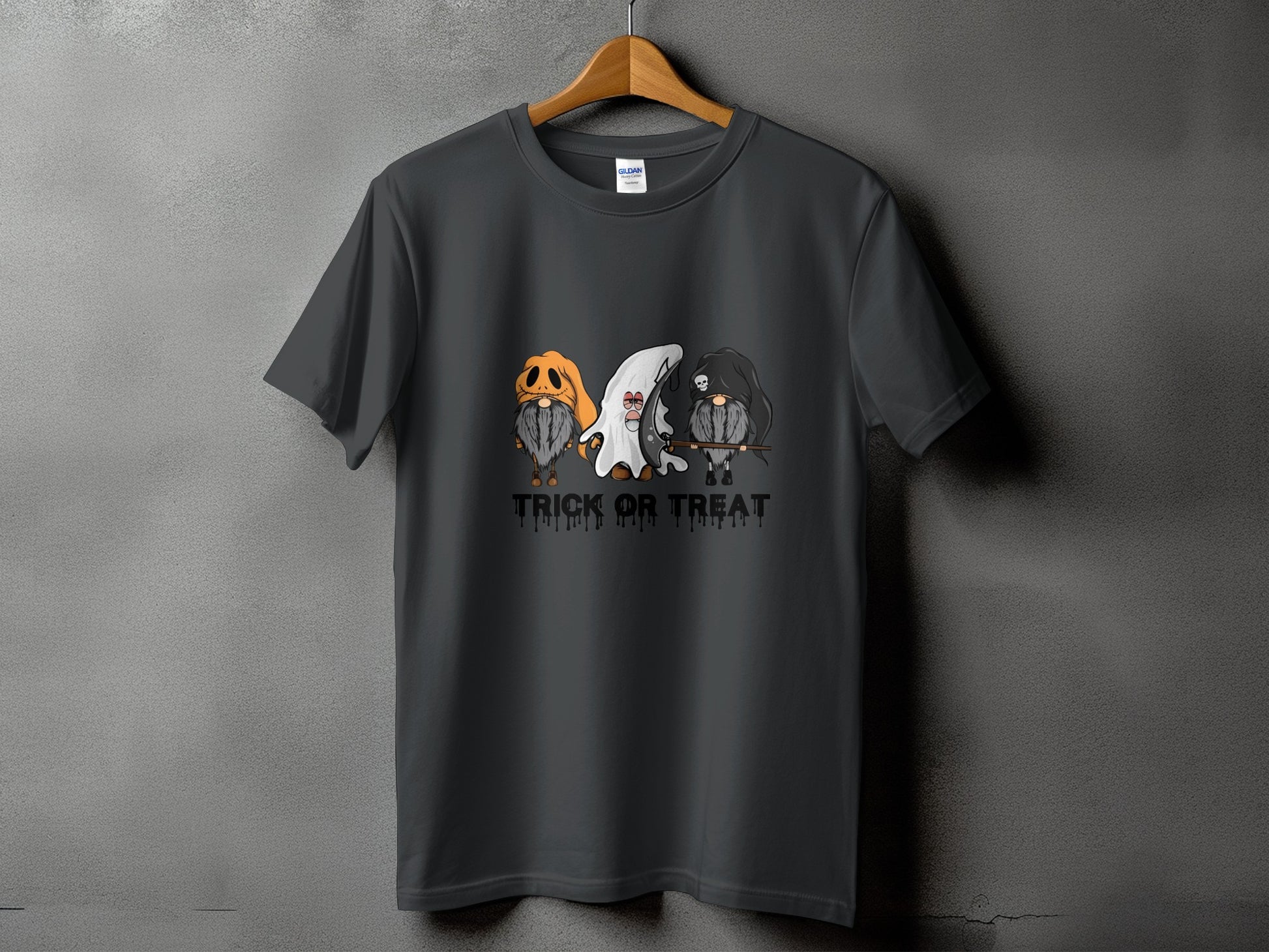 Dark t-shirt with three gnomes: pumpkin, ghost, and grim reaper. "Trick or Treat" text.