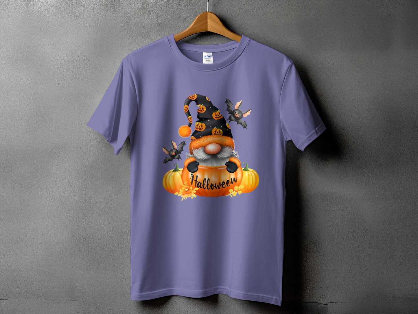 Halloween gnome sitting in a pumpkin with bats and text.