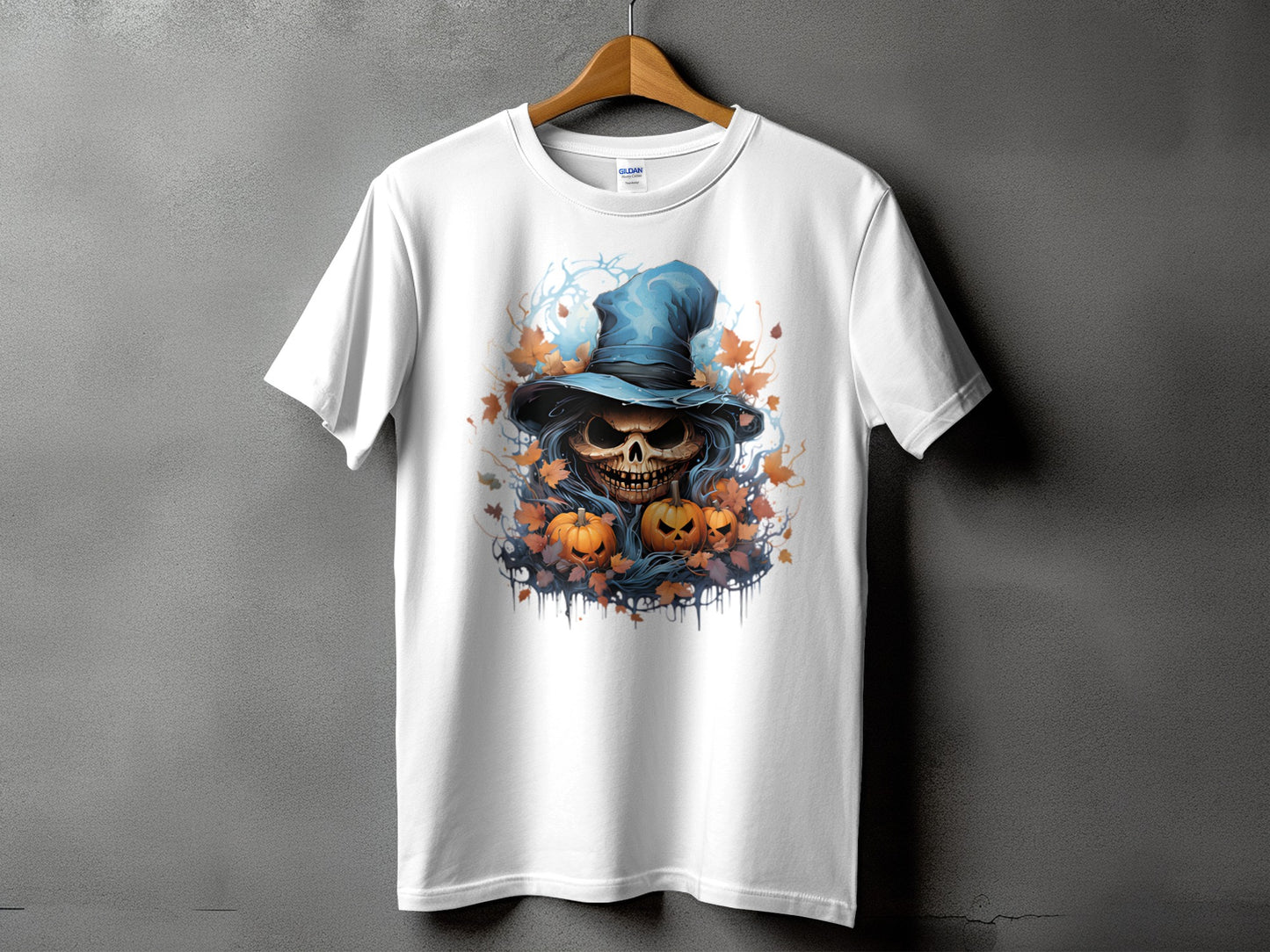 White t-shirt with a spooky jack-o'-lantern skull wearing a blue witch hat.