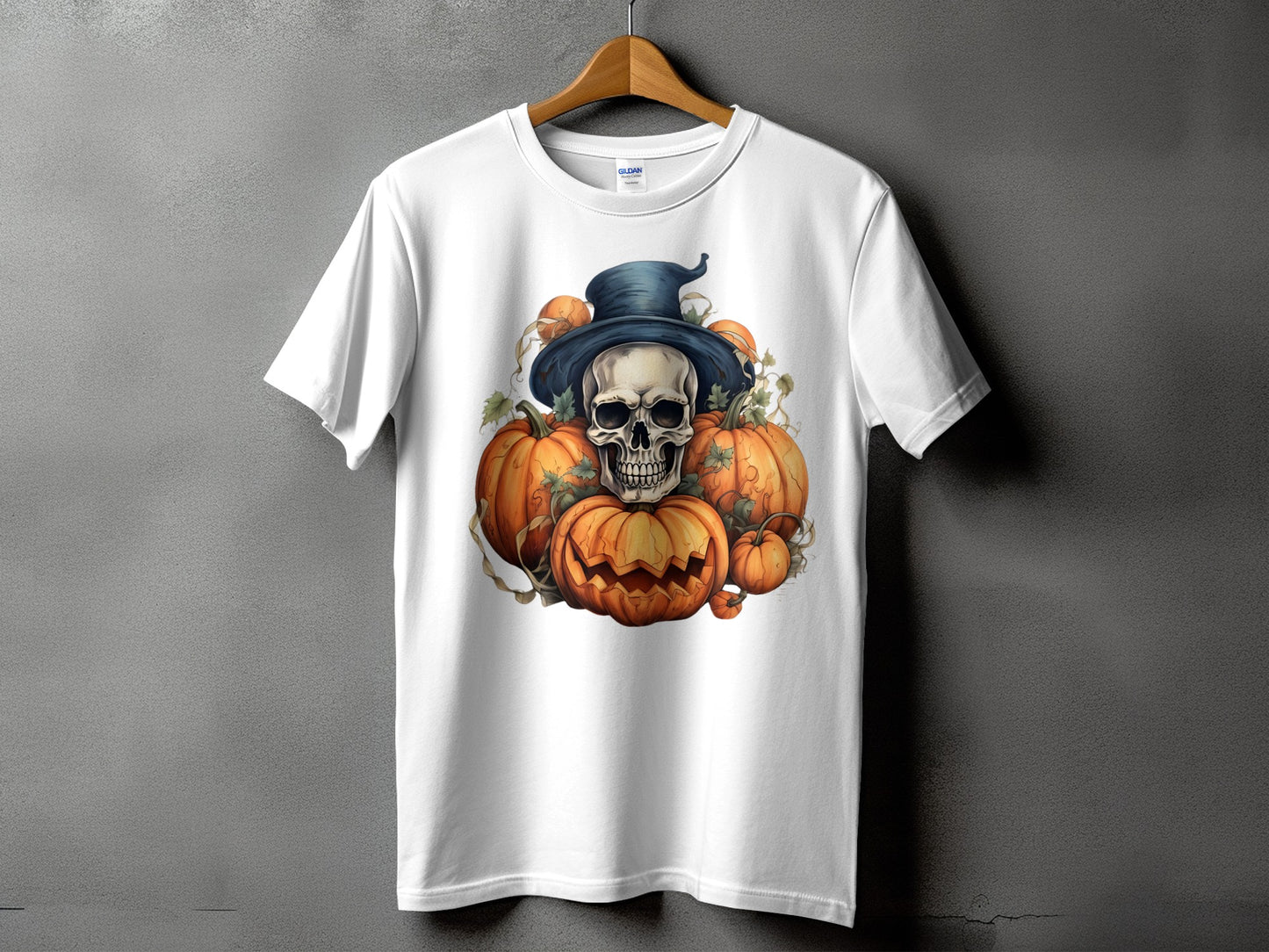 White t-shirt with skull, pumpkins, and witch hat Halloween graphic.