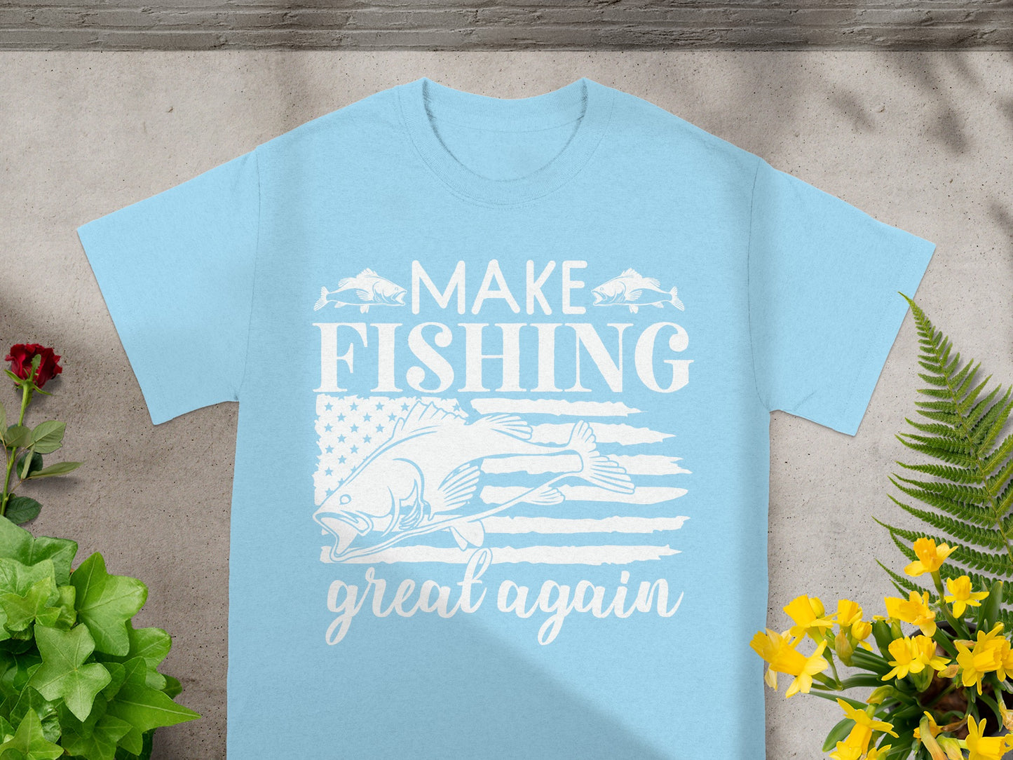 Light blue t-shirt with white text and fish graphic reading "Make Fishing Great Again."