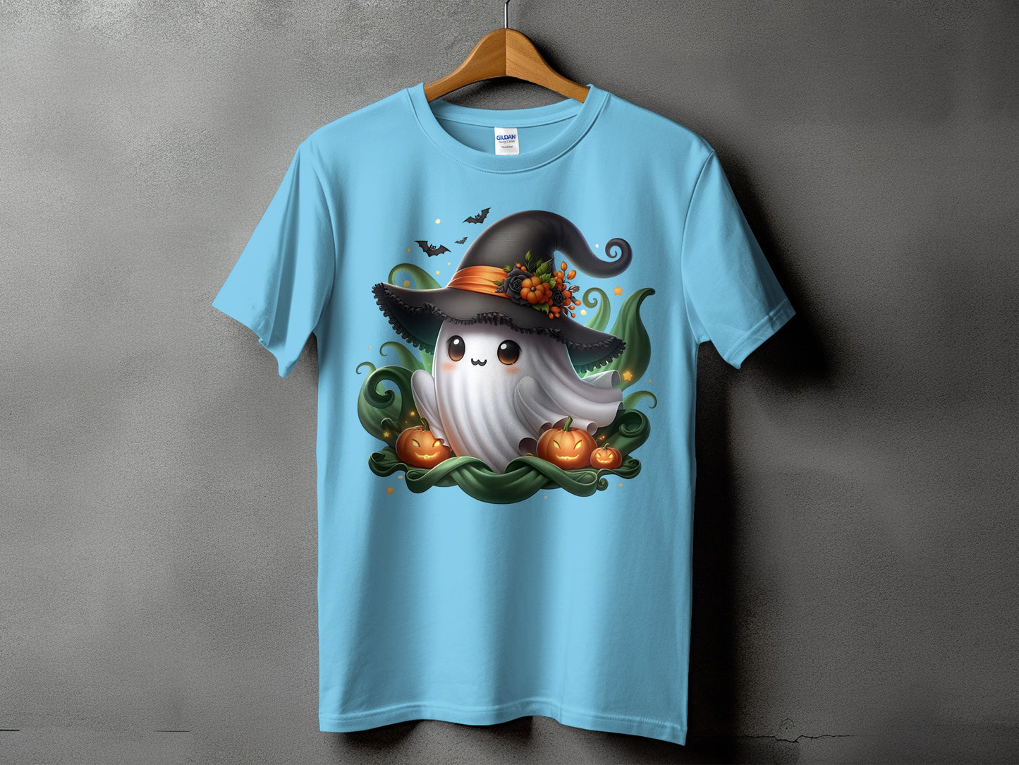 Light blue t-shirt with a cute ghost wearing a witch hat, pumpkins, and bats design.