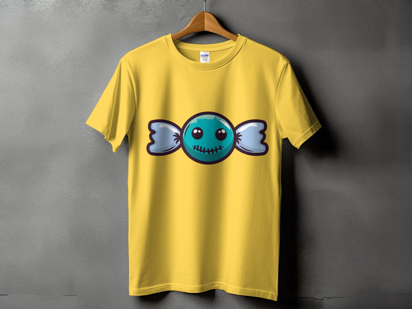 Yellow t-shirt with a cartoon candy character graphic on the front.