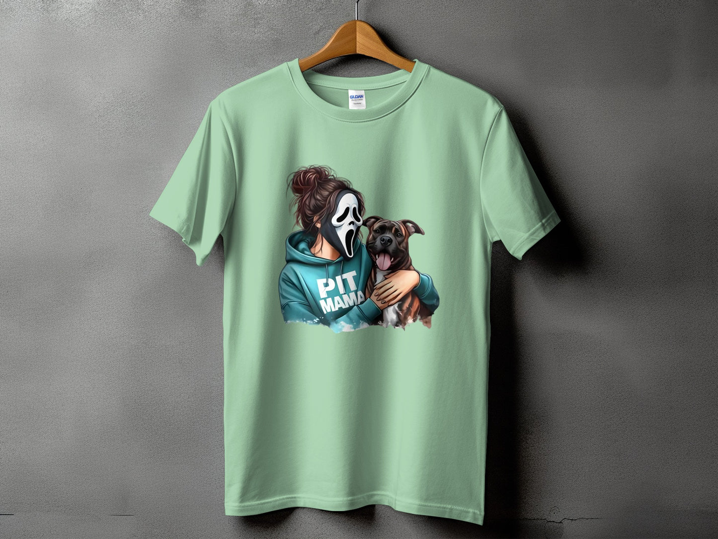 T-shirt with graphic of person in ghost mask holding pitbull and "PIT MAMA" text.