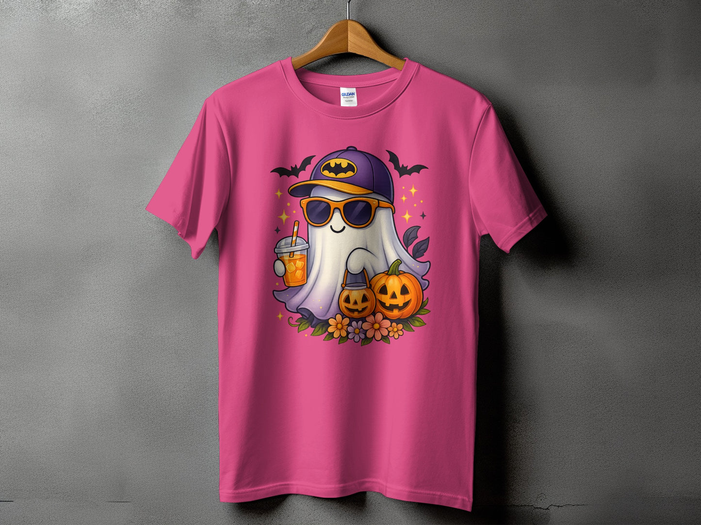 Ghost with sunglasses and Batman hat holding drink, with pumpkins and bats.