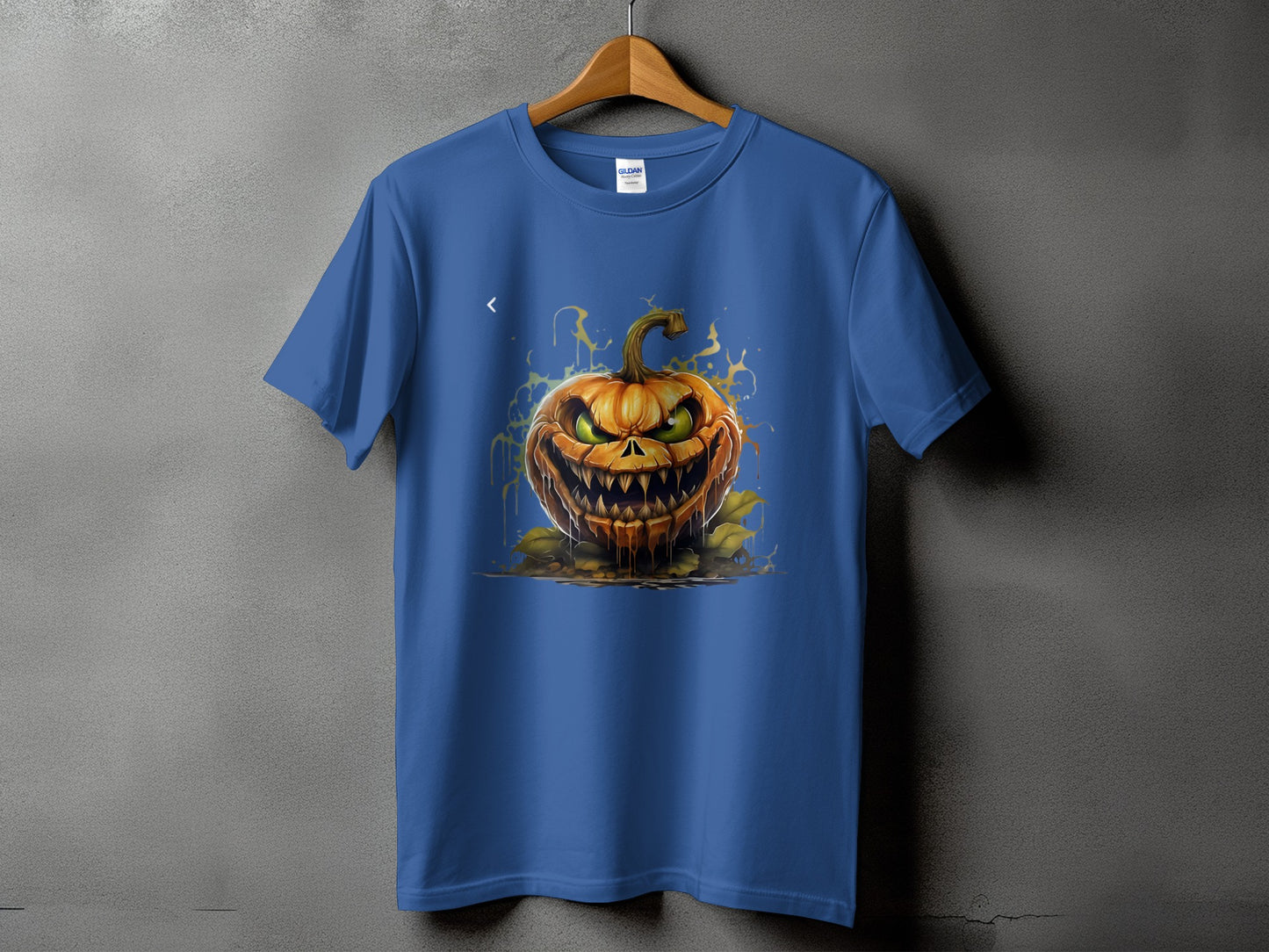 Blue t-shirt featuring a fierce jack-o'-lantern with dripping paint effect.