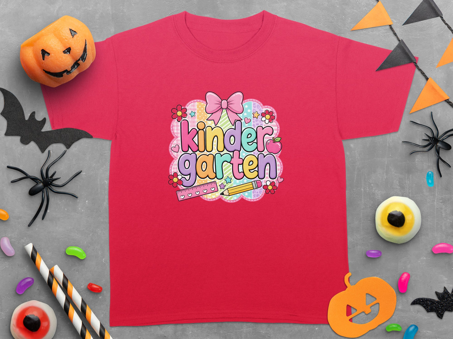 Red t-shirt with "kindergarten" text and playful Halloween decorations.