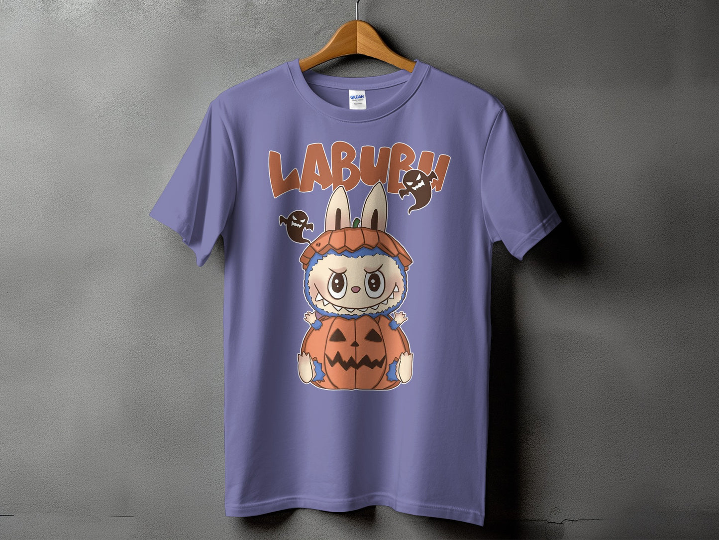 Purple t-shirt with "LABURB" text and a cartoon creature in a pumpkin costume.