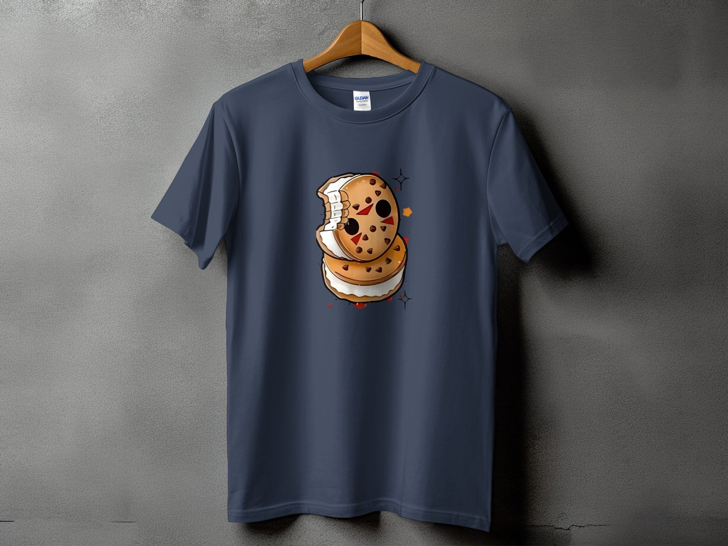 Dark blue t-shirt with a graphic of a bitten ice cream sandwich with a horror theme.