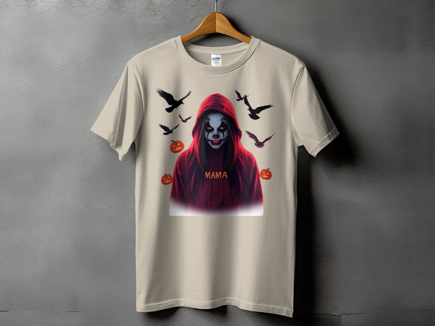 T-shirt with Halloween clown, birds, and pumpkins graphic.