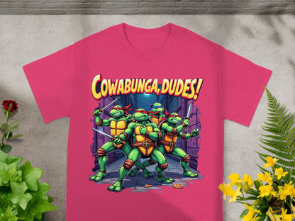 Teenage Mutant Ninja Turtles with sword, text "Cowabunga, Dudes!" on pink shirt.